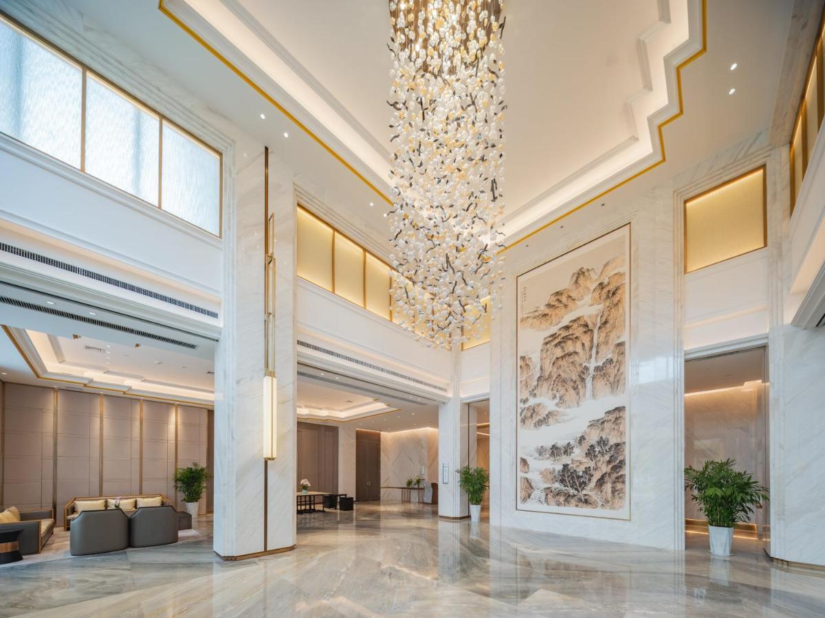 Holiday Inn Zhengzhou Zhongzhou By Ihg Экстерьер фото