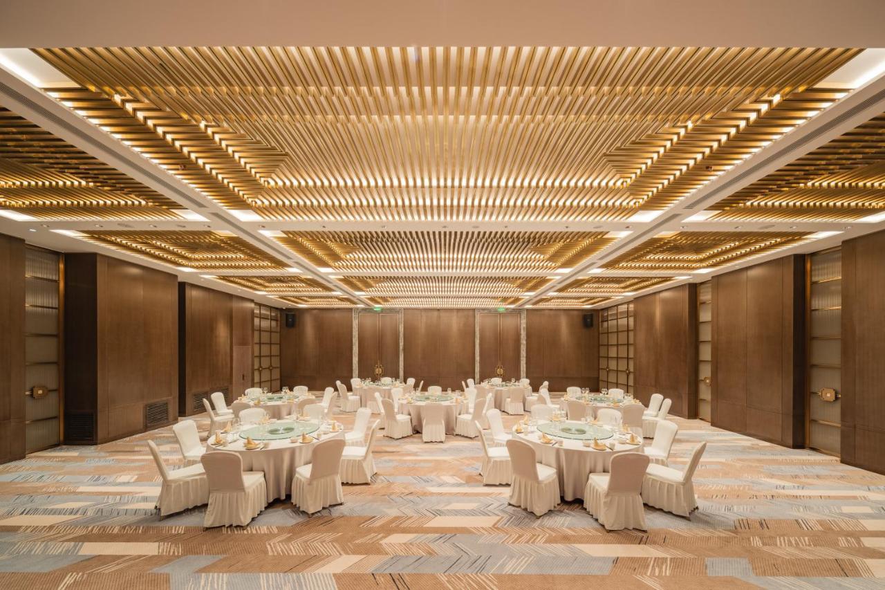Holiday Inn Zhengzhou Zhongzhou By Ihg Экстерьер фото