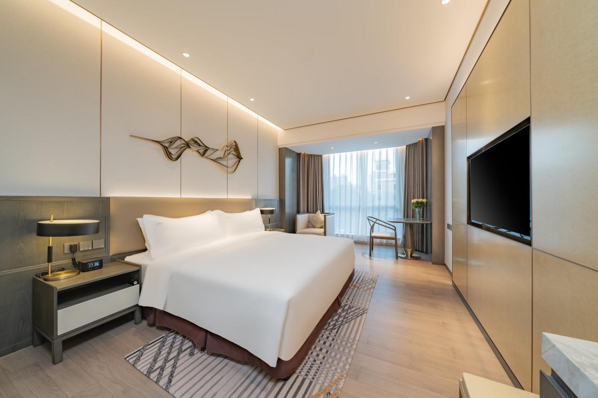 Holiday Inn Zhengzhou Zhongzhou By Ihg Экстерьер фото
