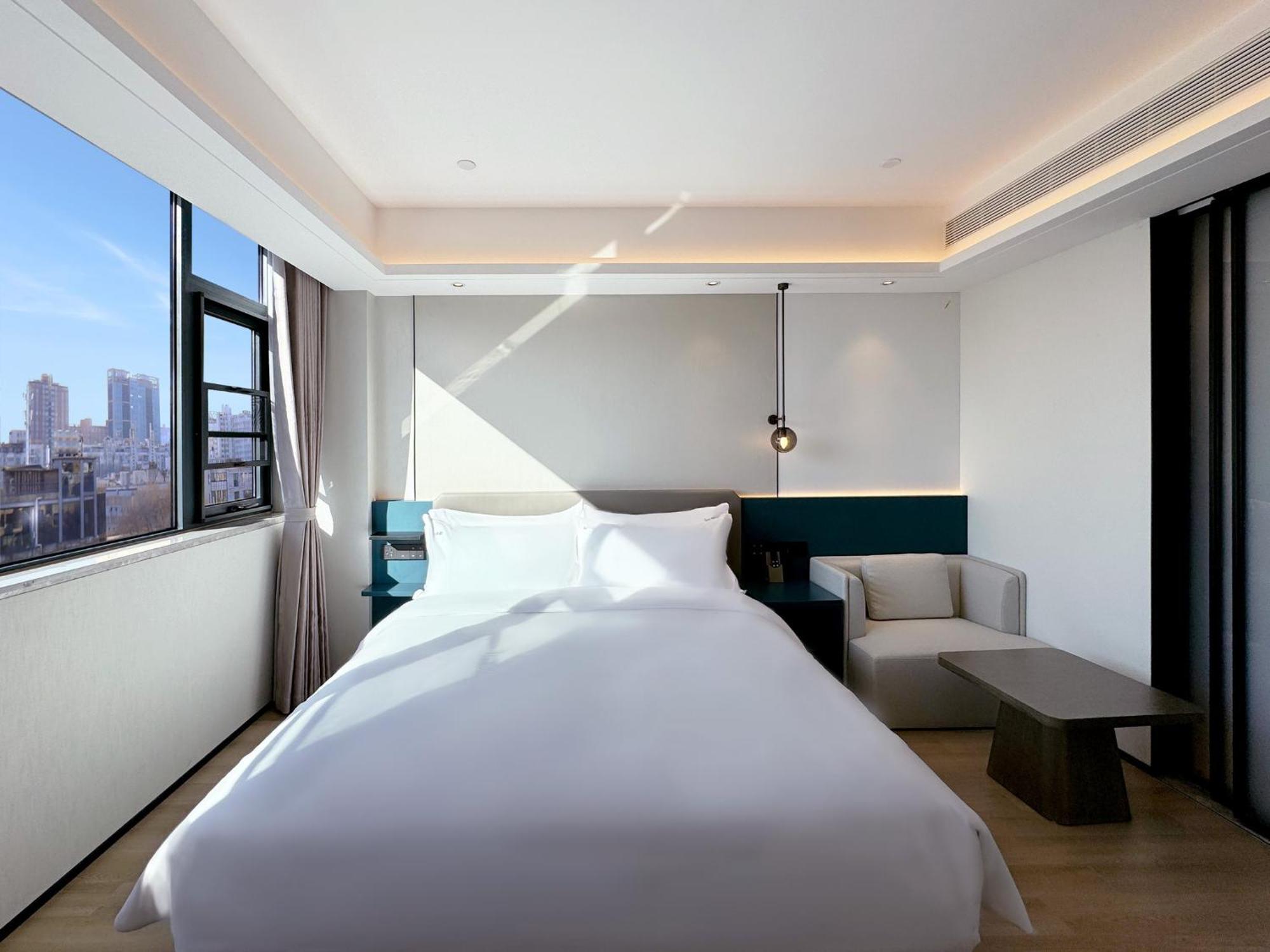 Holiday Inn Zhengzhou Zhongzhou By Ihg Экстерьер фото